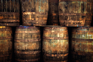 Whisky barrels stocked vertically