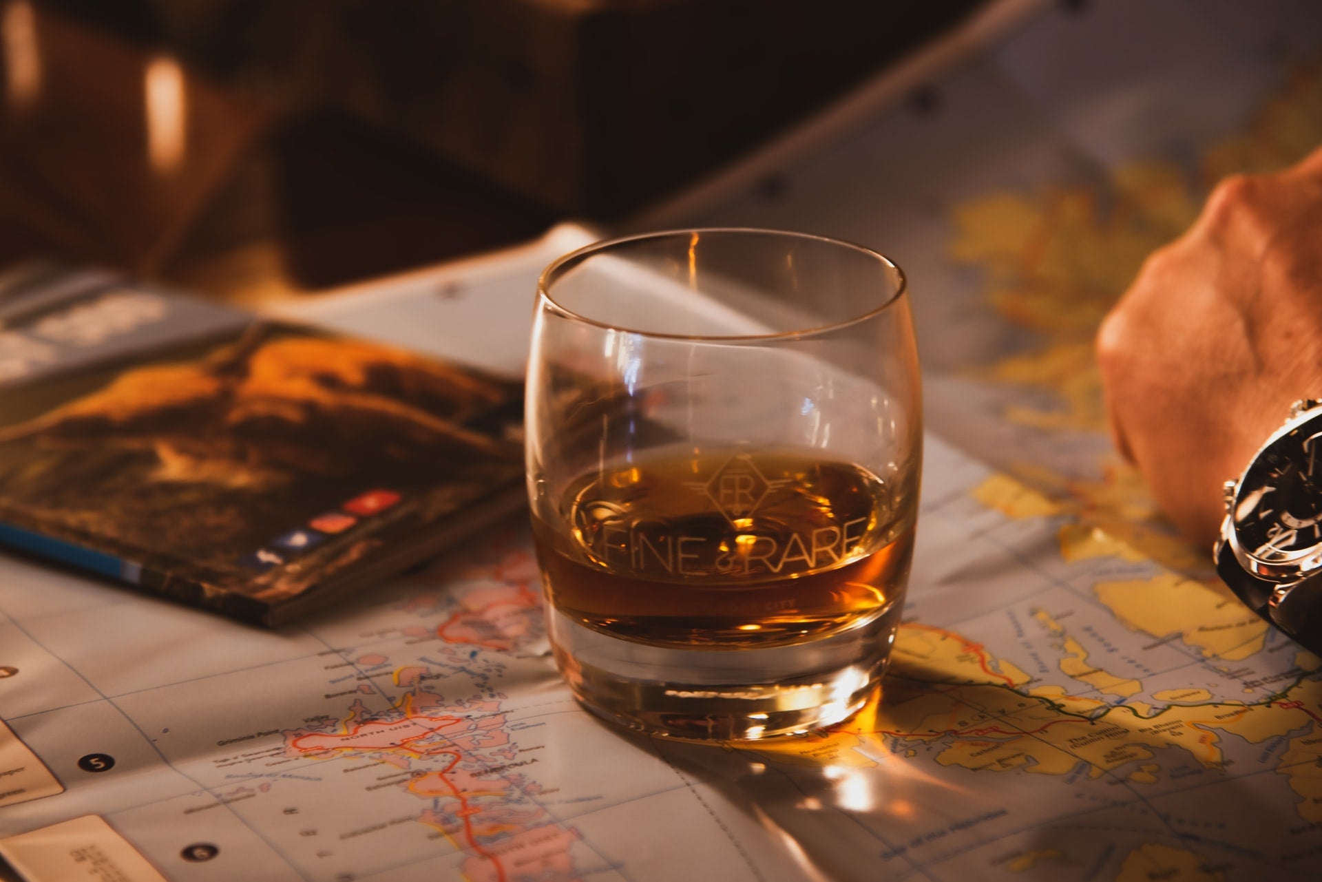 Whisky glass on world map